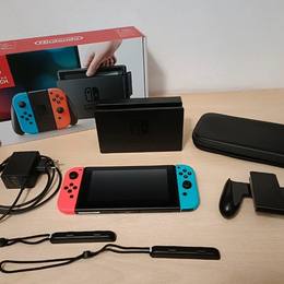 Nintendo Switch + Custodia in pelle e Scatola originale